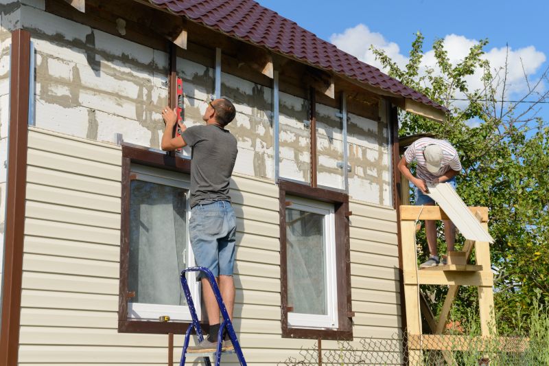 Expert Vinyl Siding Technician